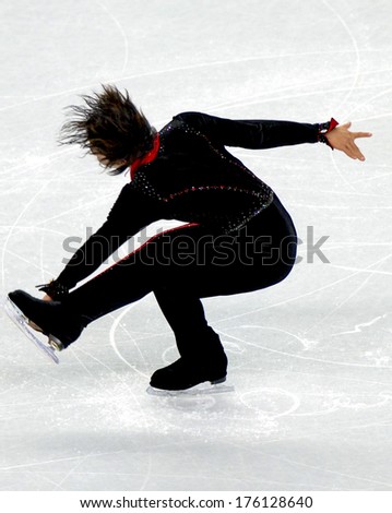 TURIN, ITALY-FEBRUARY 15, 2006: Athlete competes during the Individual Male Figure Ice Skating competition at the Winter Olympic Games of Turin 2006.