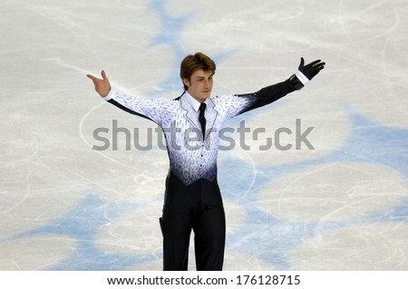 TURIN, ITALY-FEBRUARY 15, 2006: Brian Joubert competes during the Individual Male Figure Ice Skating competition at the Winter Olympic Games of Turin 2006.