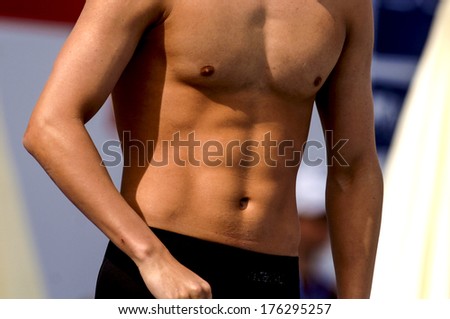 BUDAPEST, HUNGARY-AUGUST 04, 2006: Close up of swimmer man\'s abdominals muscles, during a race of the European Swimming Championship in Budapest.