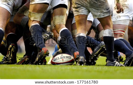 LONDON, ENGLAND-MARCH 26, 2007: Rugby players scrum during the Six Nations Tournament match England vs Italy.