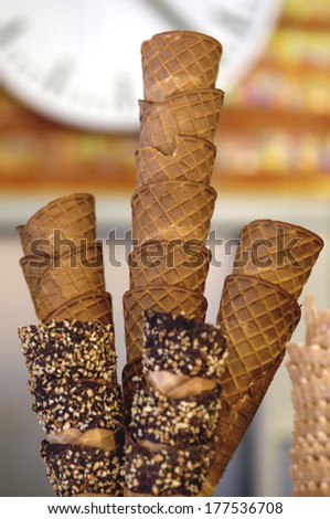 MILAN, ITALY-OCTOBER 11, 2006: Waffle cones exposition in an italian ice cream parlor.