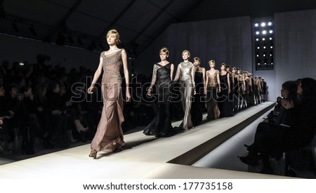 MILAN, ITALY-FEBRUARY 26, 2010: Models on runway catwalk during the spring-summer fashion collection of italian stylist Alberta Ferretti.