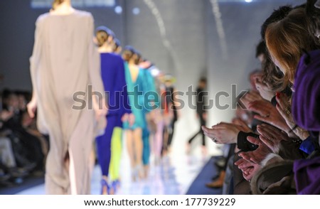 MILAN ITALY-MARCH 01 2010 Models on runway catwalk during the spring-summer fashion collection of Mila Schon MILAN ITALY-MARCH 01 2010 Models on runway catwalk during the spring-summer fashion collection of Mila Schon