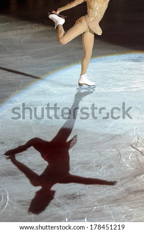 MILAN, ITALY-OCTOBER 11, 2008: American Sasha Cohen\'s shadow on ice while competing on the Figure Ice Christmas Gala at the Forum arena in Milan.
