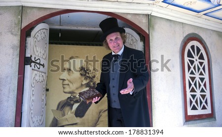 ODENSE, DENMARK-FEBRUARY 16, 2012: Actor playing the role fairytale\'s writer Hans Christian Andersen, inside the amusement park family of the writer museum.