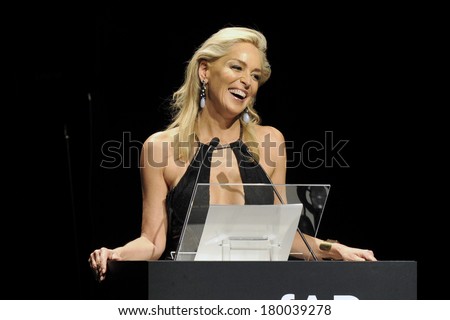 MILAN, ITALY-SEPTEMBER 22, 2012: Actress Sharon Stone, charity auctioneer for AmFar, the Foundation for AIDS Research, during the Fashion Week in Milan.