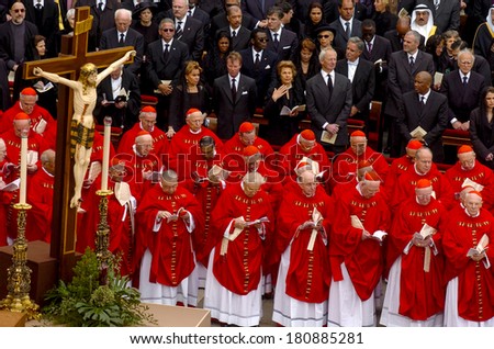 ROME, ITALY-APRIL 08, 2005:  Cardinals and International political audience, stand by the coffin of Pope John Paul II during his funeral in St. Peter square, Vatican City.