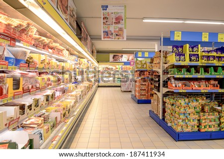 VARESE, ITALY-APRIL 11, 2014: Packaged food in a supermarket shelves, in Varese.