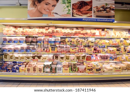 VARESE, ITALY-APRIL  11, 2014: Packaged food in a supermarket refrigeratore shelve, in Varese.