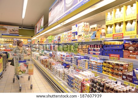 VARESE, ITALY-APRIL 11, 2014: Packaged foods in a supermarket aisle, in Varese.