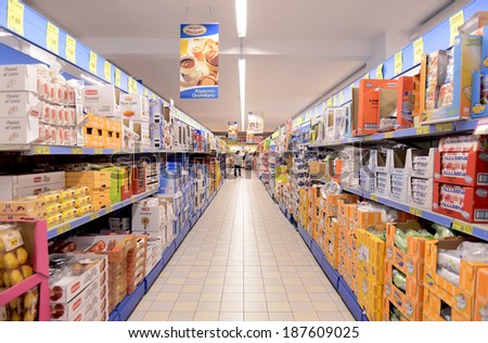 VARESE, ITALY-APRIL 11, 2014: Packaged foods in a supermarket aisle, in Varese.