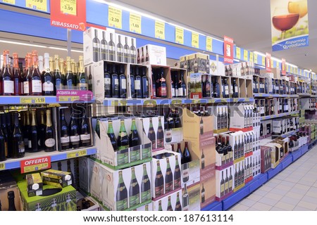VARESE, ITALY-APRIL 11, 2014: Wine beverage aisle in a supermarket, in Varese.