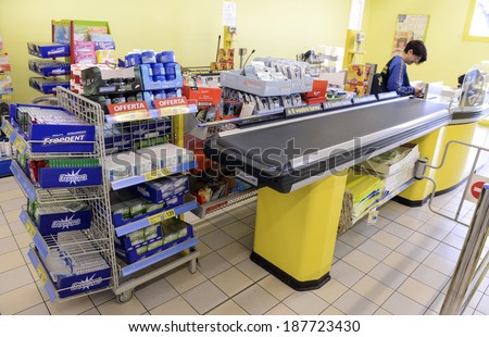 VARESE, ITALY-APRIL 11, 2014: Supermarket cashier, in Varese.