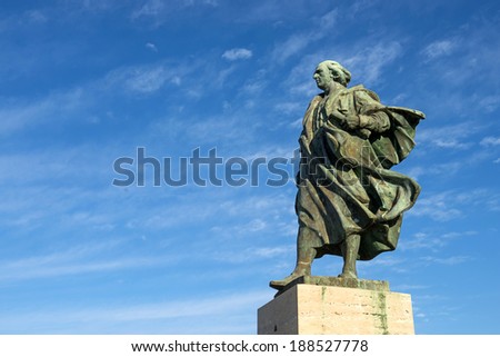 LAVAGNA, ITALY-APRIL 20, 2014: The marble statue of Christopher Columbus, the italian famous boat commander, on the sea front, in Lavagna.