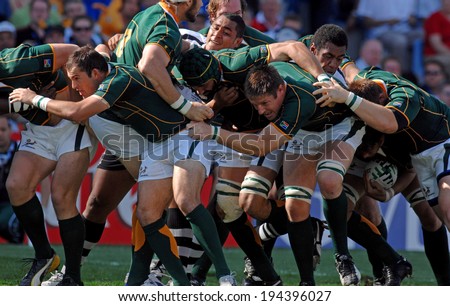 MARSEILLE, FRANCE-OCTOBER 07, 2007: rugby players of South Africa, move forward togheter with the ball during the match Fiji vs South Africa, of the Rugby World Cup France 2007, in Marseille.