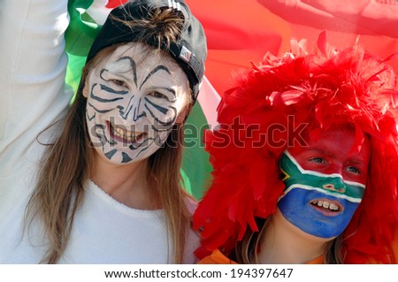 MARSEILLE, FRANCE-OCTOBER 07, 2007: masked face South African supporters cheering during the match Fiji vs South Africa, of the Rugby World Cup France 2007, in Marseille.