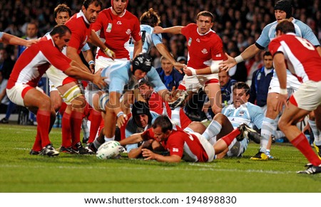 LYON, FRANCE-SEPTEMBER 12, 2007: rugby players scrum, during the rugby match Argentina vs Georgia, of the Rugby World Cup, France 2007, in Lyon.