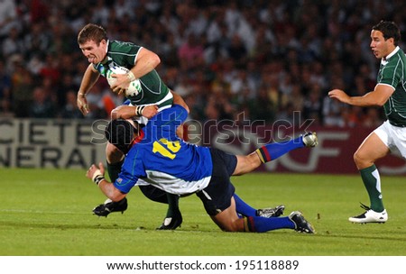 BORDEAUX, FRANCE-SEPTEMBER 09, 2007: irish palyer Gordon D'Arcy, runs with the ball, during the match Ireland vs Namibia, of the Rugby World Cup, France 2007, in Bordeaux.