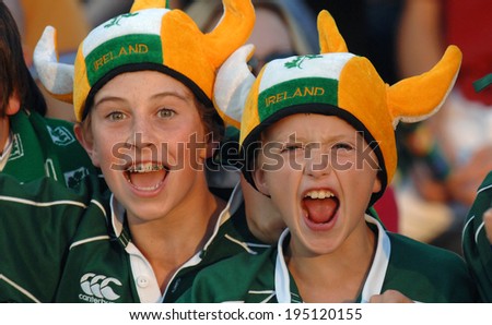 BORDEAUX, FRANCE-SEPTEMBER 09, 2007: young irish fans cheering during the match Ireland vs Namibia, of the Rugby World Cup, France 2007, in Bordeaux.