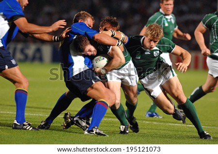 BORDEAUX, FRANCE-SEPTEMBER 09, 2007: irish rugby player runs with the ball, during the match Ireland vs Namibia, of the Rugby World Cup, France 2007, in Bordeaux.