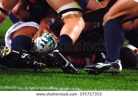 SAINT-ETIENNE, FRANCE-SEPTEMBER 27, 2007: rugby player holds the balls in a scrum, during the rugby match USA vs Samoa, of the Rugby World Cup, France 2007, in Saint-Etienne.