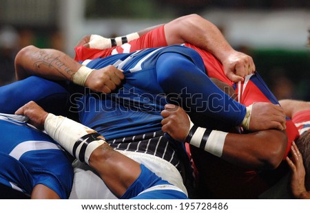 SAINT-ETIENNE, FRANCE-SEPTEMBER-27, 2007: Samoa and USA rugby players scrum during the match USA vs Samoa, of the Rugby World Cup, France 2007, in Saint-Etienne.