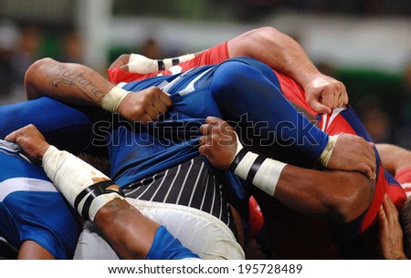 SAINT-ETIENNE, FRANCE-SEPTEMBER-27, 2007: Samoa and USA rugby players scrum during the match USA vs Samoa, of the Rugby World Cup, France 2007, in Saint-Etienne.
