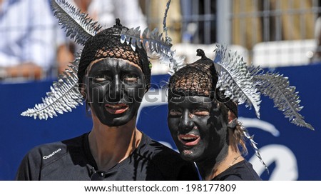 MARSEILLE, FRANCE-SEPTEMBER 08, 2007: new zealand rugby fan girls with black face mask during the rugby world cup of france 2007 match New Zealand vs Italy, in Marseille.