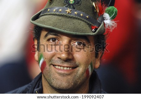 SAINT ETIENNE, FRANCE-SEPTEMBER 30, 2007: italian fan man with national flag masked face, during the Rugby World Cup match Italy vs Scotland, in Saint Etienne.