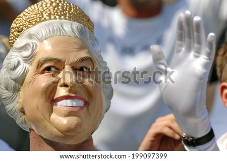 MARSEILLE, FRANCE-OCTOBER 06 2007: rugby fans wearing a Queen Elizabeth mask, during the Rugby World Cup match England vs Australia, in Marseille.