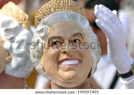 MARSEILLE, FRANCE-OCTOBER 06 2007: rugby fans wearing a Queen Elizabeth mask, during the Rugby World Cup match England vs Australia, in Marseille.
