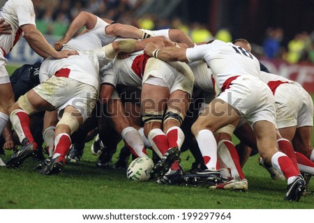 PARIS, FRANCE-OCTOBER 14, 2007: english and french rugby players pushing in scrum, during the match France vs England, of the Rugby World Cup, in Paris.