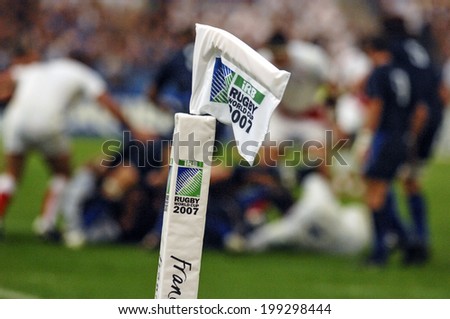 PARIS, FRANCE-OCTOBER 14, 2007: the try flag with in the background, english and french rugby players pushing in scrum, during the match France vs England, of the Rugby World Cup, in Paris.