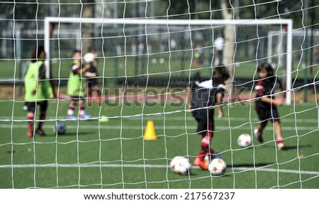 MILAN, ITALY-SEPTEMBER 13, 2014: AC Milan youth soccer training session at the Vismara center, in Milan.