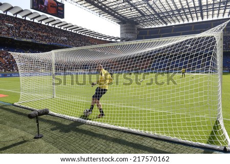 MILAN, ITALY-SEPTEMBER 14, 2014: goalkeeper training on the soccer pitch of San Siro stadium, before the Serie A professional soccer match Inter vs Sassuolo, in Milan.