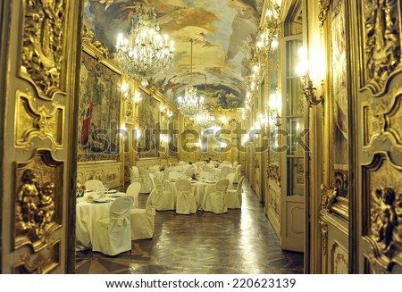 MILAN, ITALY-SEPTEMBER 28,2014: gala dinner preparation on the golden vintage Tiepolo room of Clerici palace, in Milan