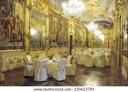 MILAN, ITALY-SEPTEMBER 28,2014: gala dinner preparation on the golden vintage Tiepolo room of Clerici palace, in Milan