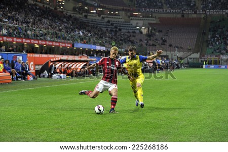 MILAN, ITALY-OCTOBER 04,2014: AC Milan japanese player Keisuke Honda in action at the san siro stadium during the Italian serie A soccer match AC Milan vs Chievo Verona, in Milan.