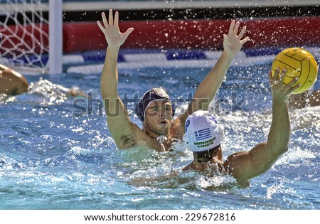 BARCELONA, SPAIN-SEPTEMBER 03, 1999: italian water polo player Alberto Angelini defends during the World Water Polo Championship, in Barcelona.