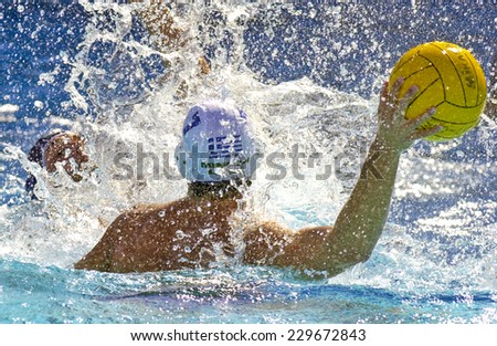 BARCELONA, SPAIN-SEPTEMBER 03, 1999: water polo player in action during the World Water Polo Championship, in Barcelona.