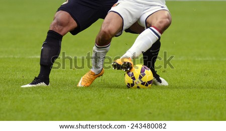 MILANO, ITALY-JANUARY 11, 2015: close up of soccer players in action at san siro stadium during italian serie A soccer match FC Internazionale vs Genoa CFC, in Milan.