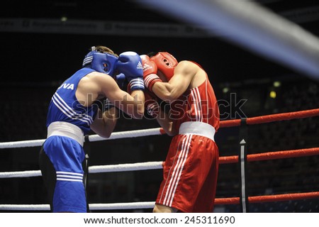 MILAN, ITALY-SEPTEMBER 05, 2009: non professional boxe match zhang  vs milevski of the boxe amateur world championship, in Milan