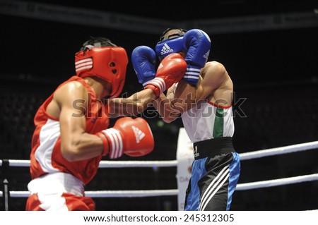 MILAN, ITALY-SEPTEMBER 05, 2009: non professional boxe match tipon vs ouradi of the boxe amateur world championship, in Milan