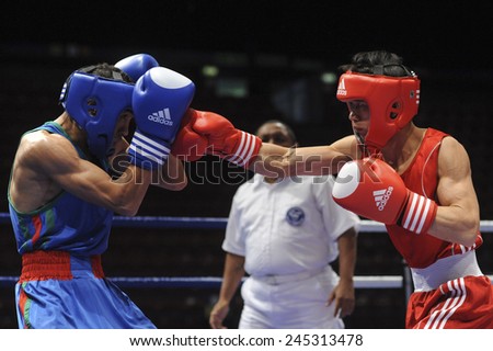 MILAN, ITALY-SEPTEMBER 07, 2009: non professional boxe match li vs bouchtouk of the boxe amateur world championship, in Milan