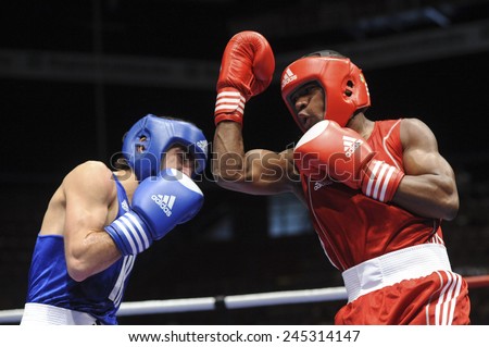 MILAN, ITALY-SEPTEMBER 07, 2009: non professional boxe match leon alarcon vs andreiana of the boxe amateur world championship, in Milan