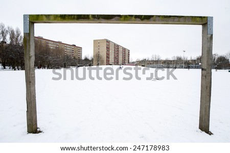 MALMO, SWEDEN-FEBRUARY 20, 2008: soccer playground field covered by snow with  building houses project, in Malmo.