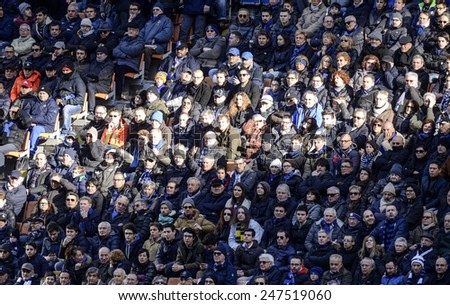 MILAN, ITALY-JANUARY 25, 2015: soccer stadium fans gathering at the san siro stadium for the serie A match FC Internazionale vs Torino, in Milan.