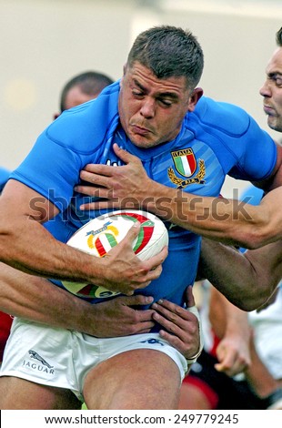L\'AQUILA, ITALY-NOVEMBER 11, 2004: italian rugby player Andrea Lo Cicero holds the ball during the rugby test match Italy vs Canada, in L\'Aquila.