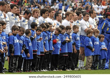 ROME, ITALY-MARCH 15, 2008: italian rugby players team embracing together to sing the national anthem the Six Nations rugby tournament match Italy vs Scotland, in Rome.