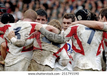LONDON, ENGLAND-MARCH 18, 2007: english rugby players embracing toghether during the Six Nations rugby match England vs Italy, in London.